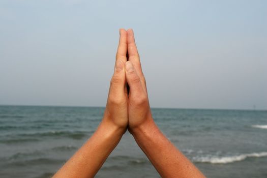 hands on the beach. on a nice day