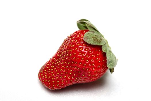 A single strawberry on a white background