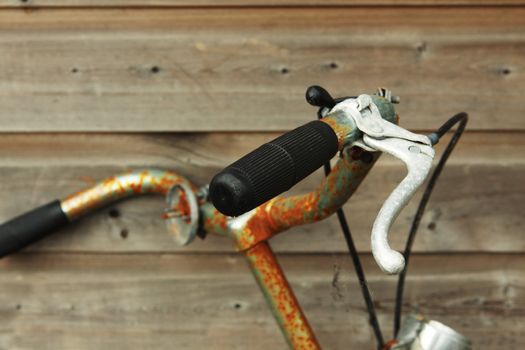 close up handlebar of old rusty bike