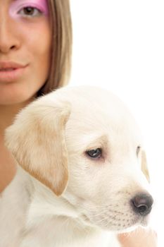 Cheerful young woman with her puppy isolated on white background