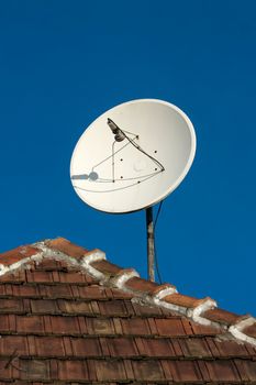 Parabola satellite receiver on a roof