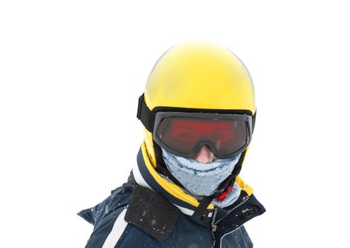 Portrait of a female skier in yellow helmet