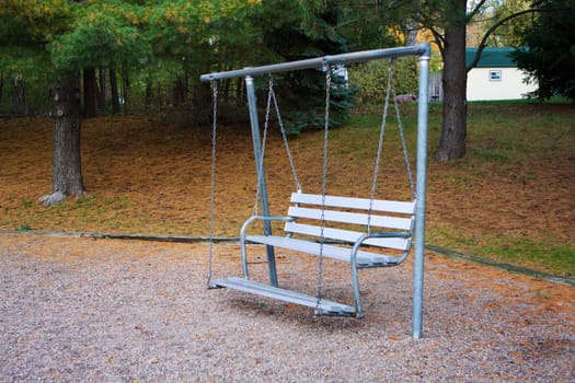 Bench Swing sits quietly in the park.