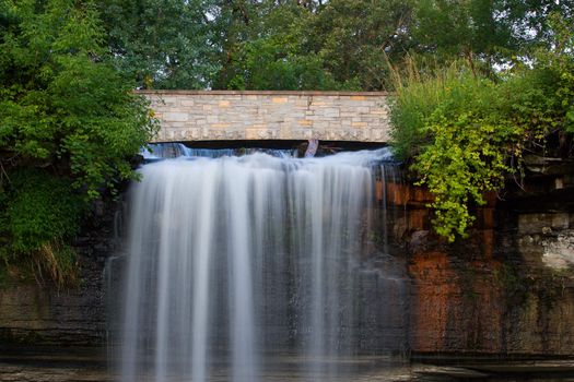 The top of a Minneapolis waterfall and bridge.