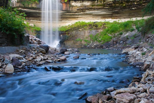 Beautiful Minnehaha Creek Waterfall and downstream river.