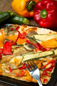 slice of pizza with fresh vegetables