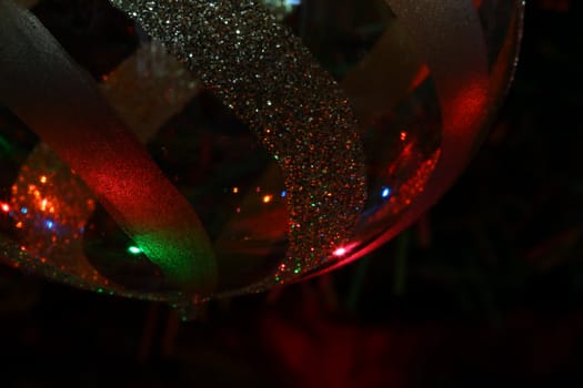 Christmas ornament hanging from a Christmas tree.