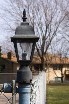 Here is an old rustic light Pole at a local pool.