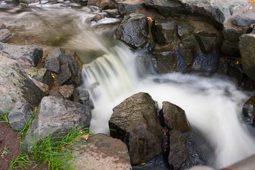 Neat looking creek with smooth water running by.