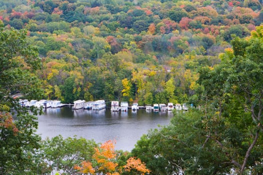 The Mississippi River and parked boats during the autumn season.