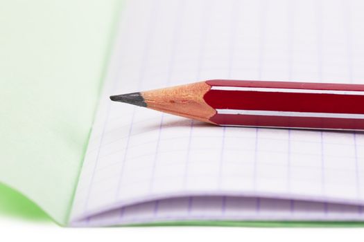 Macro view of pencil on a blank sheet