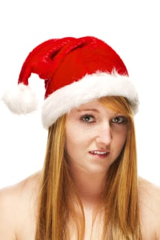 young redhead woman wearing santas hat on white background