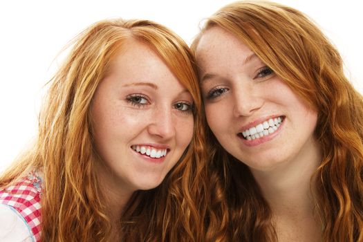 two happy bavarian redhead girls on white background