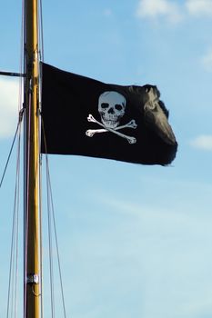 Pirate ship flag of the Skull and Crossbones.