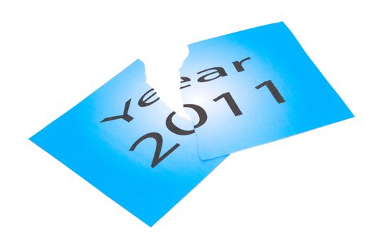 The end of 2011, as typified by its rupture. Blue paper with black text year the 2011th