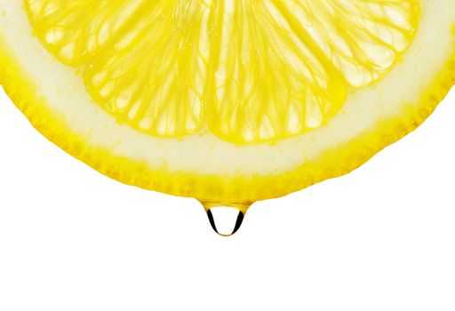 Section lemon with drop. The detailed photo on a gleam. It is isolated on a white background