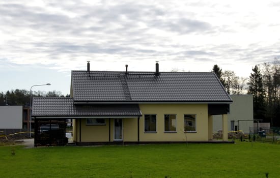 Modern apartment house on a background of the blue sky