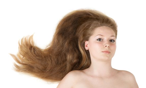 Healthy beautiful long hair closeup in motion created by wind. Isolated on white