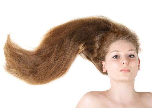 Healthy beautiful long hair closeup in motion created by wind. Isolated on white
