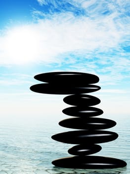 Zen stone on water.Stock pebble on sky background