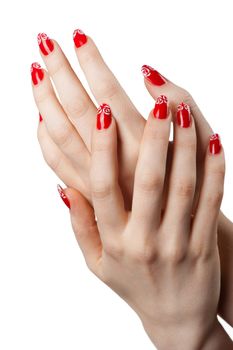 Female hands with French manicure. It is isolated on a white background