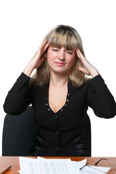 Headache. The business woman on the workplace tired of work. It is isolated on the white background.