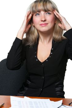 Headache. The business woman on the workplace tired of work. It is isolated on the white background.