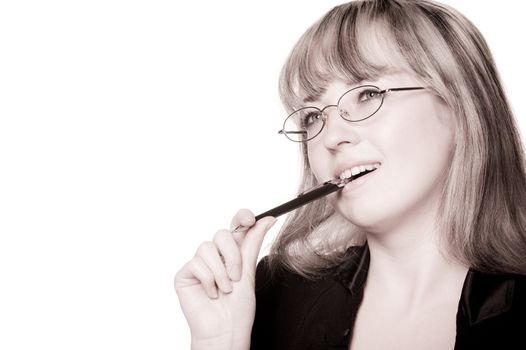 The business woman in eyeglasses and with pen.Toned color.Isolated on the white background.