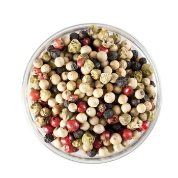 Mixed peppercorns in bowl from directly above and isolated on white background