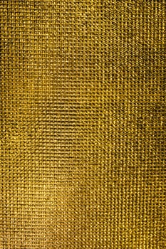 Gold texture. Detailed finely scaly metal surface