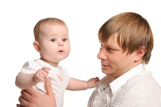 The father and the daughter. The child age of 8 months. It is isolated on a white background