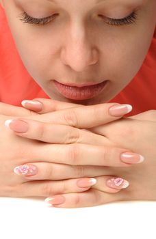 Manicure. Well-groomed female hands with a decorative element - a flower