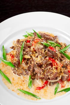 tasty dish of sliced beef roasted with vegetables