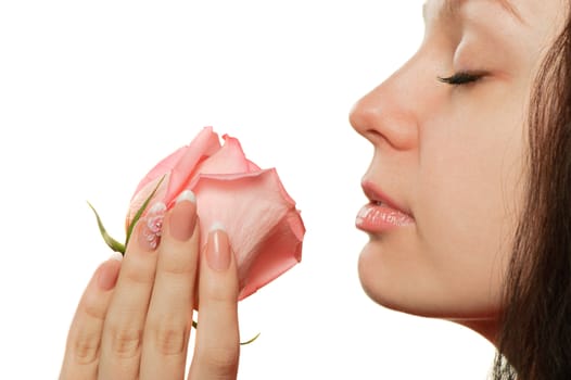 The woman with a rose closeup. Isolated on white