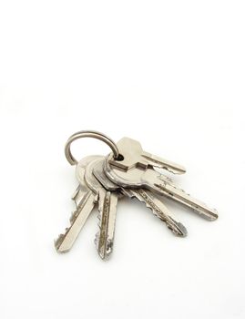 Silver keys isolated over white background.