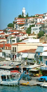 View of clock tower and picturesque greek town