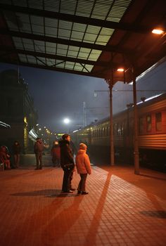 The image of station with people at night