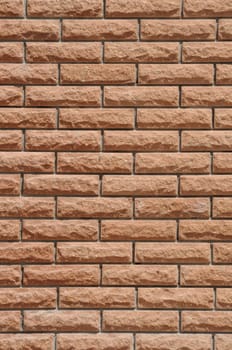 Fragment of a wall from a front red brick