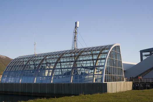 The famous polar museum in Tromso, with the ship "fram" framed in glass as a part of the exhibition. 