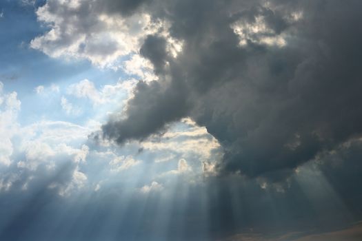The image of a cloud with beams