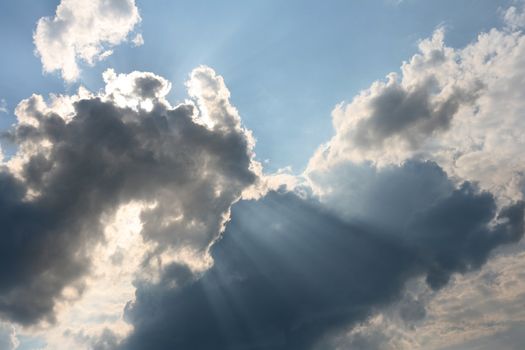 The image of a cloud with beams