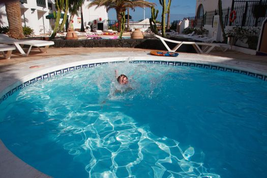 girl having fun in the pool