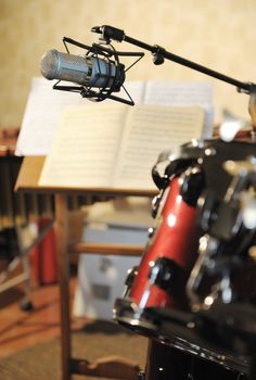 Studio musical microphone. A photo in real musical studio. Selective focus