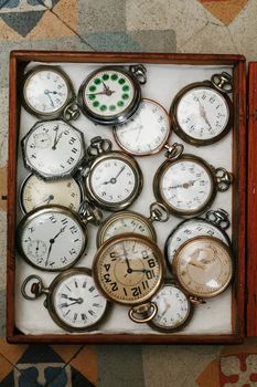 Old vintage watches in a cigar box
