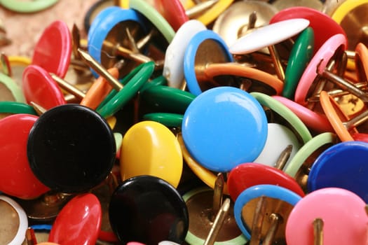 close-up of thumbtacks...........