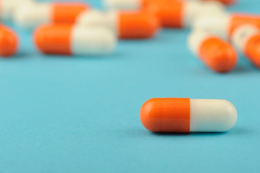 set capsules on blue background. Photo closeup