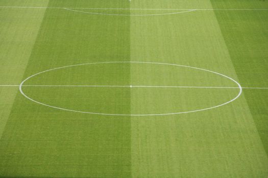 a empty soccerfield in a stadion...........