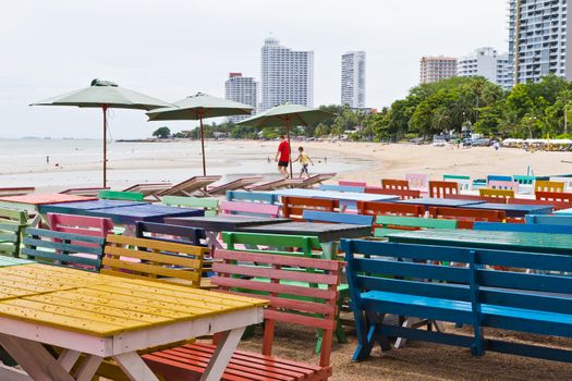 Tables, chairs, colorful. Side of the seafood restaurants. The eastern part of Thailand.