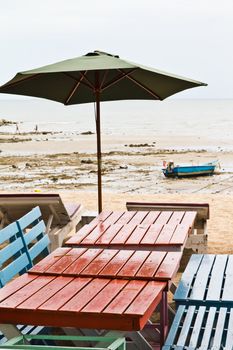 Tables, chairs, colorful. Side of the seafood restaurants. The eastern part of Thailand.