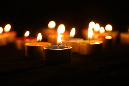 colourful candles on black